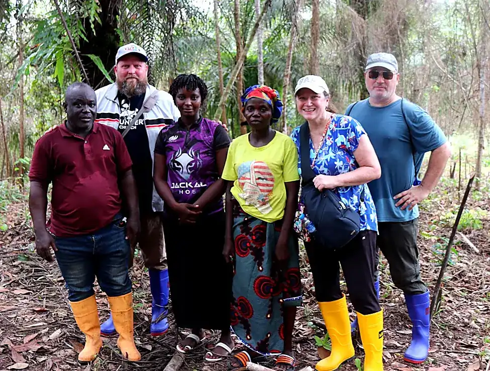 Visitors and local people together in a forest